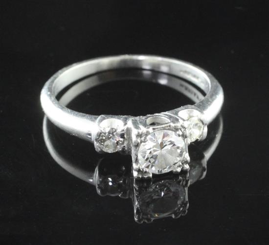 A mid 20th century platinum and single stone diamond ring, size I.